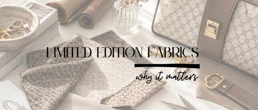     Limited edition designer-inspired fabrics, leather swatches, gold hardware, and artisan tools arranged in a luxury handbag design studio.